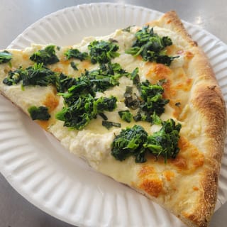 White Pizza Slice With Spinach