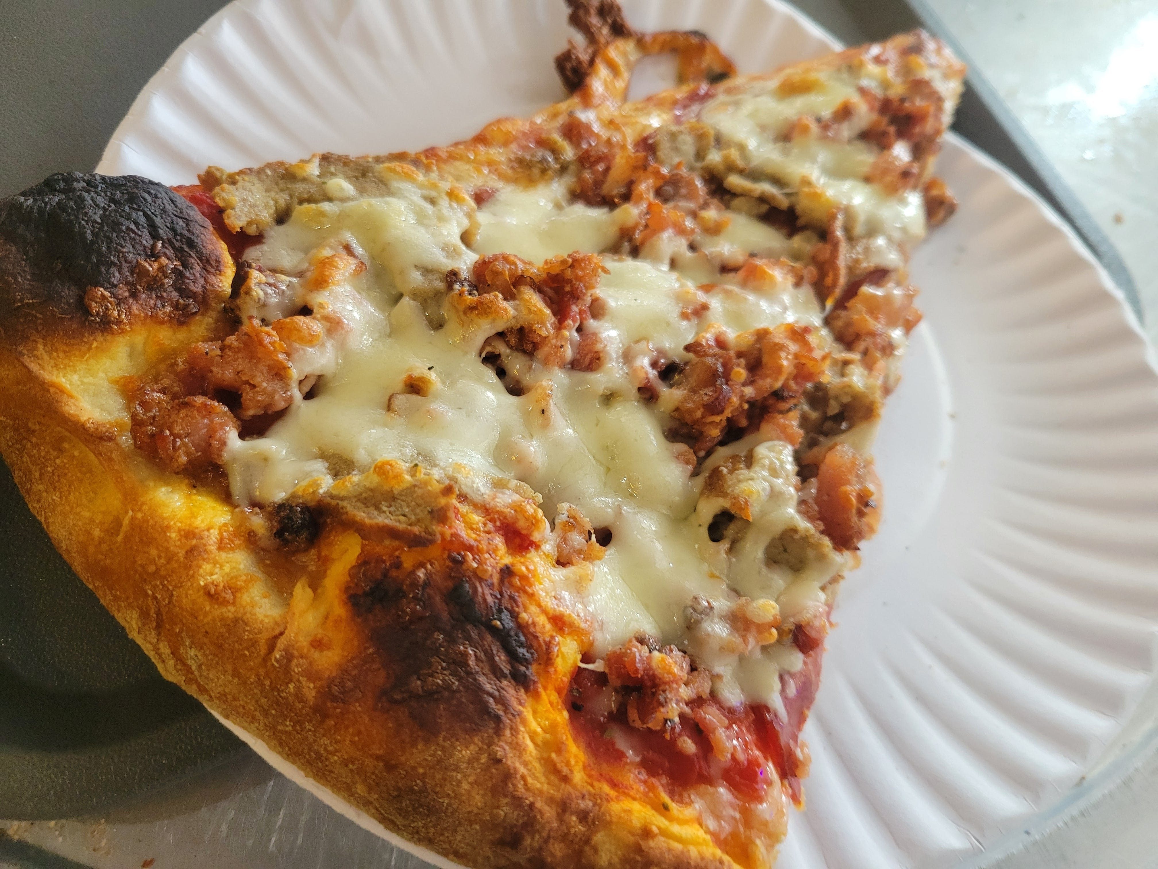 Meat Lover's Pizza Slice.